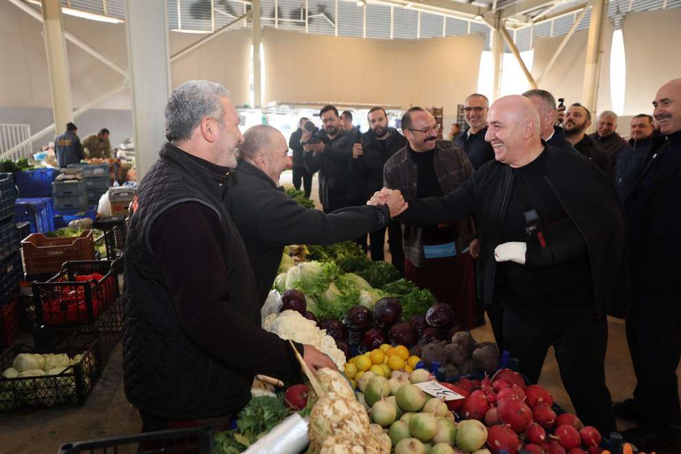 Başkanlar pazarcı esnafının sofrasına konuk oldu