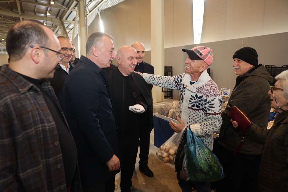 Başkanlar pazarcı esnafının sofrasına konuk oldu