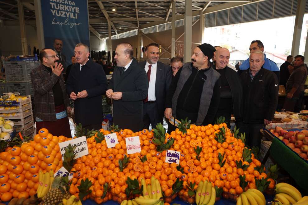 Başkanlar pazarcı esnafının sofrasına konuk oldu