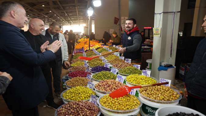 Başkanlar pazarcı esnafının sofrasına konuk oldu