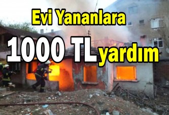 Evi yananlara 1000 TL yardım