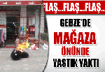 Mağaza önünde yastık yaktı